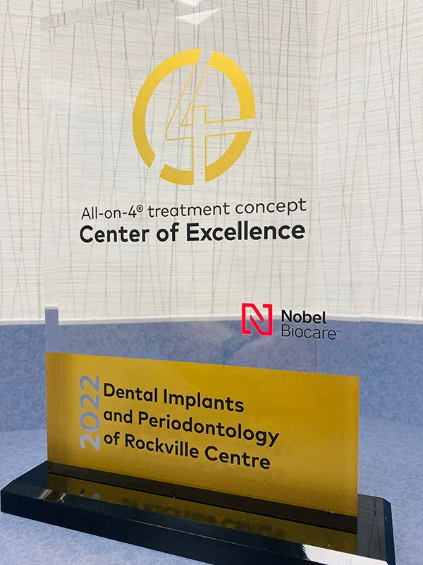 Award plaque for Dental Implants and Periodontology at Rocksville Centre, Nobel Biocare Center of Excellence.