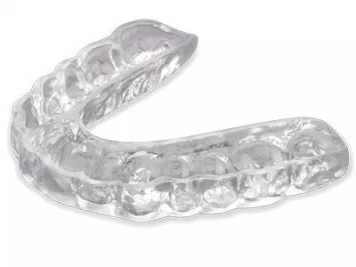 Clear plastic dental aligner or retainer tray displayed against white background.