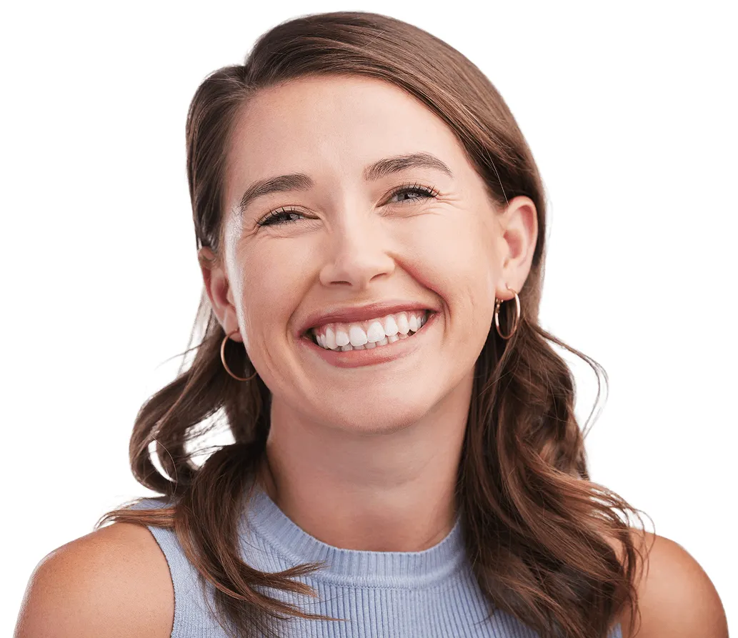 Woman smiling brightly against white background, showcasing healthy teeth and professional dental appearance.